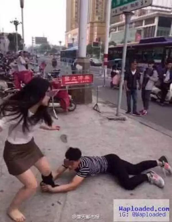 Photos: Man Embarrasses Himself In Public As He Begs Girlfriend Not To Leave Him 